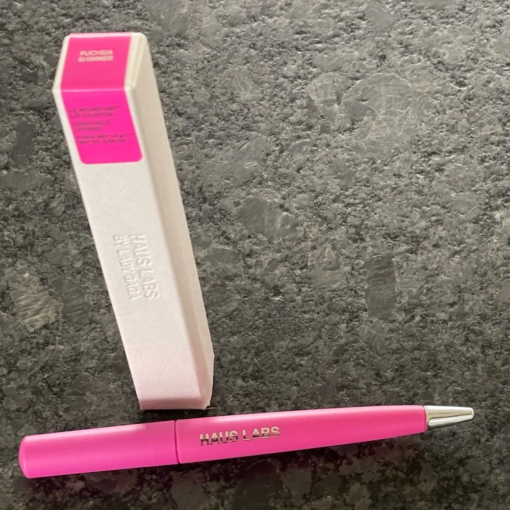 Haus LE MONSTER LIP CRAYON lipstick in Fuchsia Shimmer, a cool pink